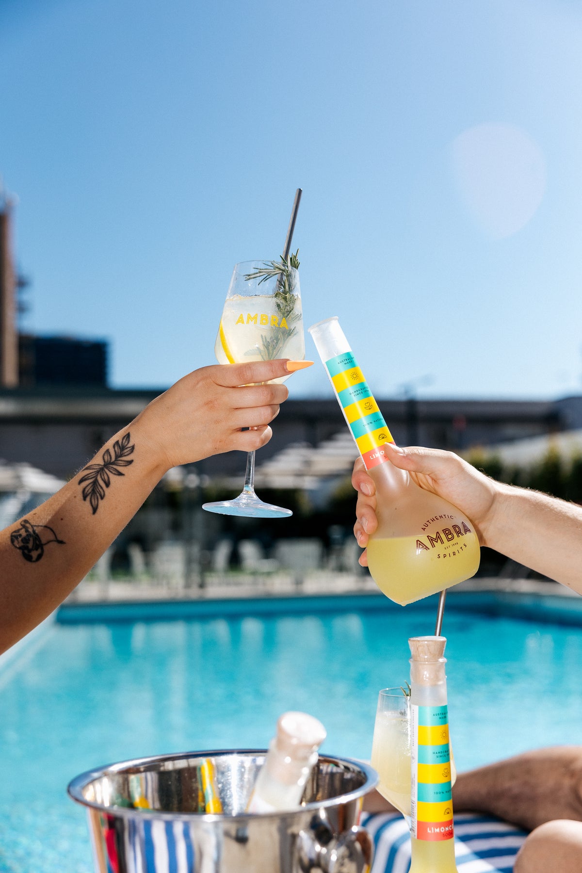 Friends sharing Ambra limoncello spritz around the table